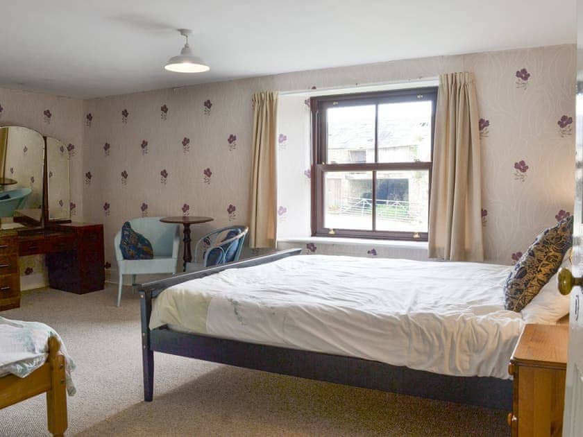Inviting bedroom | Tutchenor Farmhouse, Patchacott, near Beaworthy