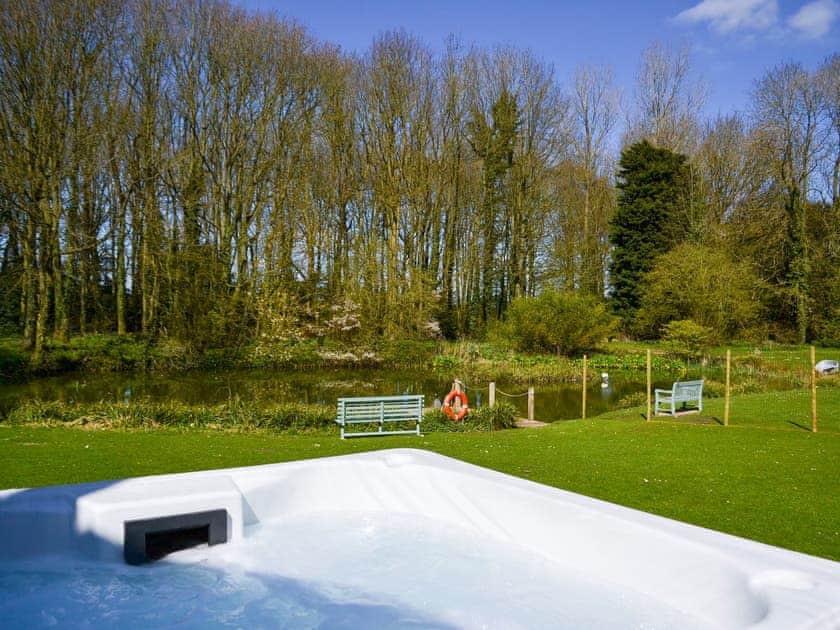 Private hot tub | Liliy Pad Lodge - Garden House Cottages, Market Stainton, near Market Rasen