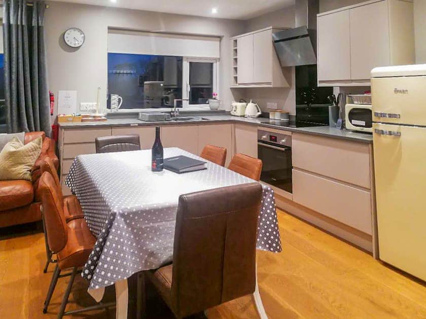 Ultra-modern fitted kitchen/dining area | Angle Tarn Cottage, Ambleside