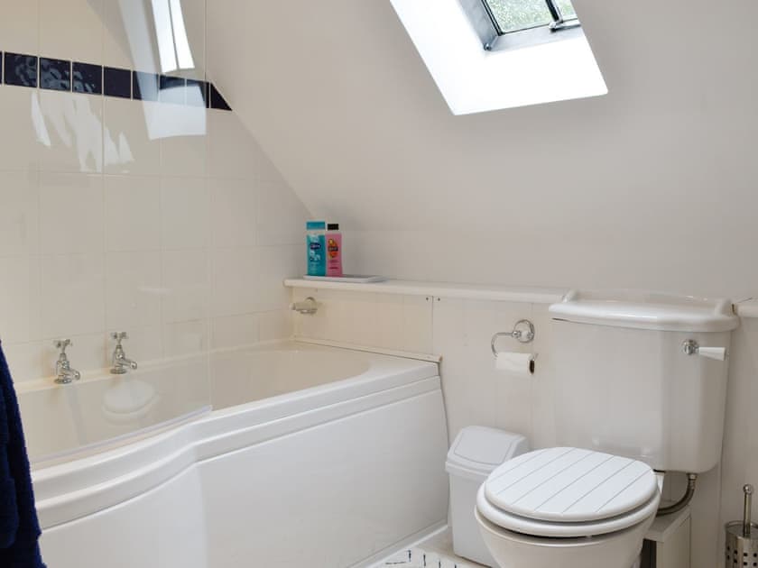 Family bathroom with shower over the bath | Beech Cottage - Cysgod Y Coed Cottages, Llanrhaeadr, near Denbigh