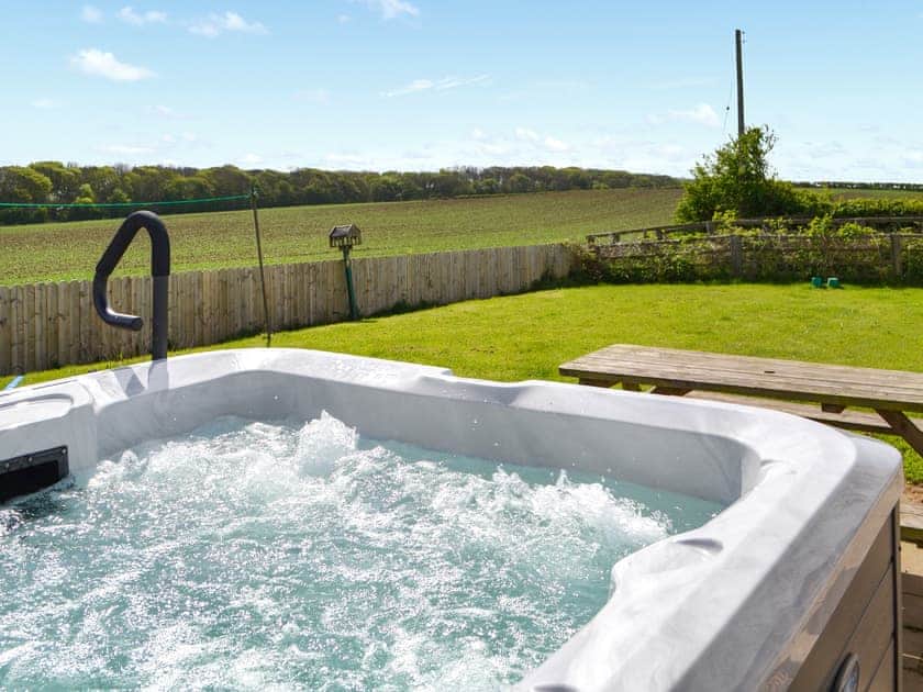 Luxurious hot tub on the patio | Granary Cottage - Metlands Farm Holidays, Bempton, near Bridlington