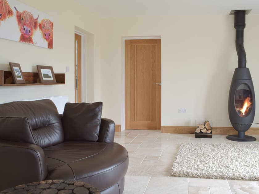 Comfy living area with feature wood burner | Y Hendy Llaeth, Red Roses, near Whitland