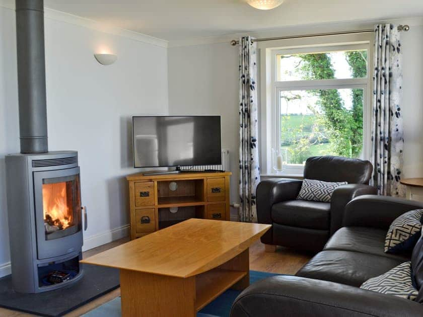 Beautifully presented living area with wood burner | Yonderton McGill Cottage - Yonderton Farm, Dalrymple, near Ayr