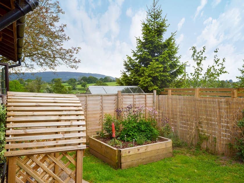Lawned garden with patio and furniture | The Barn, Neenton, near Bridgnorth