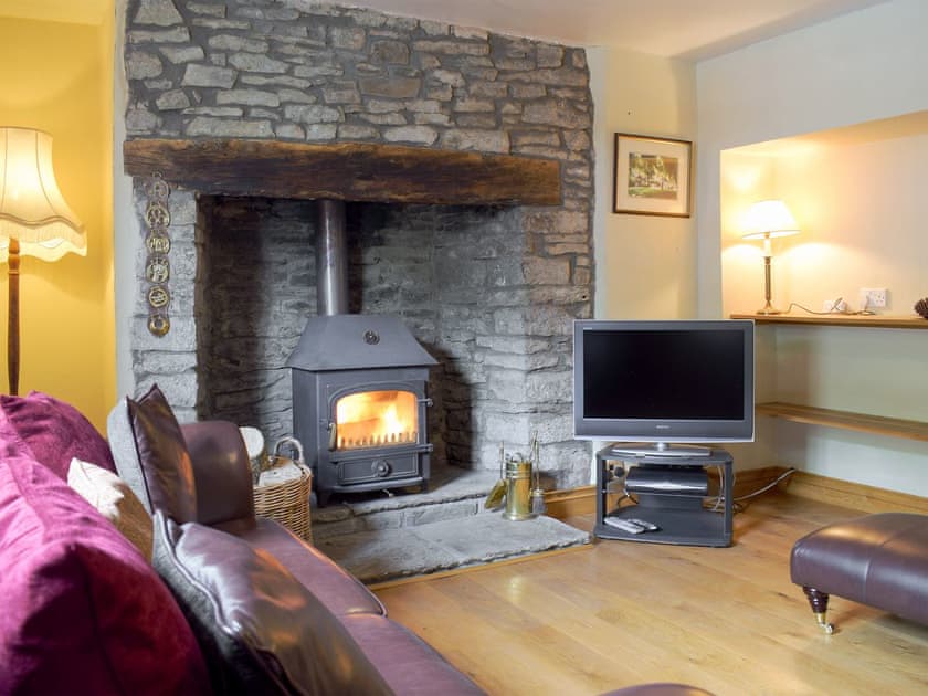 Sitting room with wood burner | The Oak, Newchurch, near Hay-on-Wye