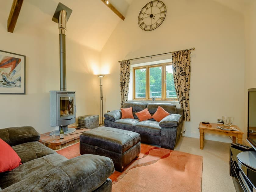 Luxurious living room with wood burner | Courtyard Lodge, Rufford, near Newark