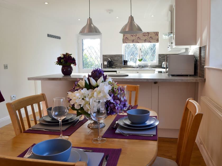 Dining area | Alice’s Lodge - New Forest Cottages, Picket Hill, near Ringwood