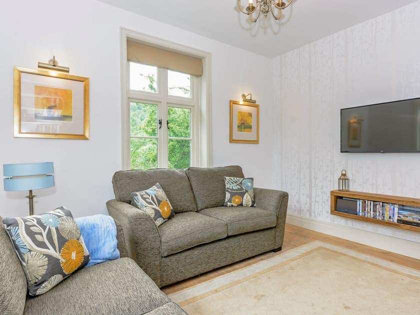 Superbly renovated living room with wood burner | Station House, Miller’s Dale, near Buxton