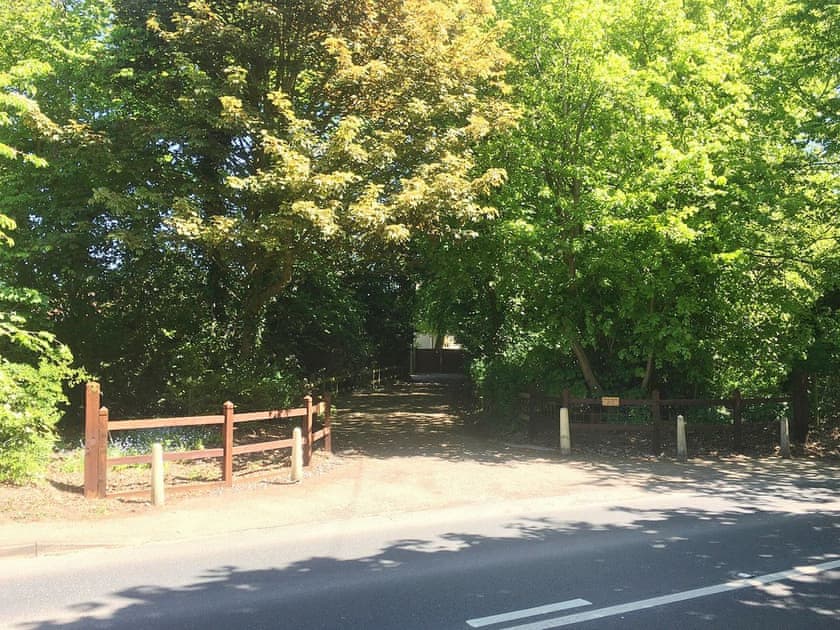 Coach House is 60 yards inside this drive entrance on your left hand side | The Coach House, Holt