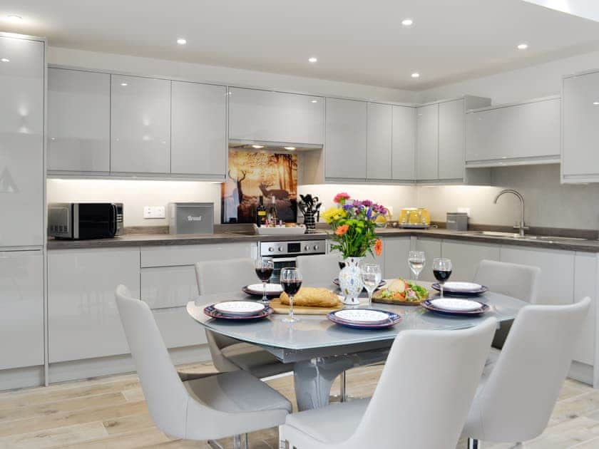 Convenient dining area and fully appointed kitchen | Ramerish Retreat, Laurieston, near Gatehouse of Fleet