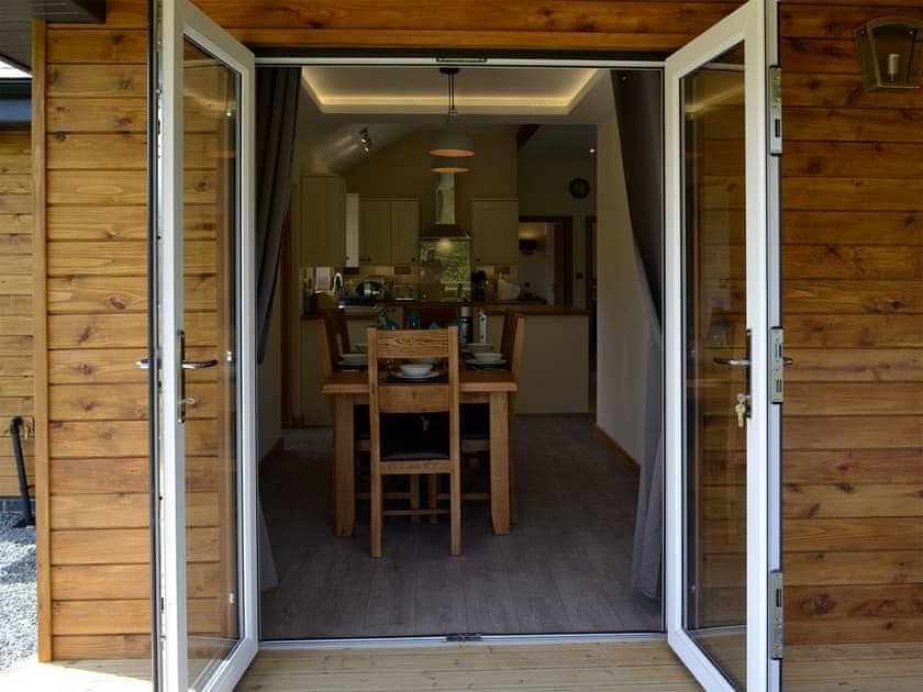 Dining area | River Lodge - Bryncoch Holidays, Hundred House, near Builth Wells