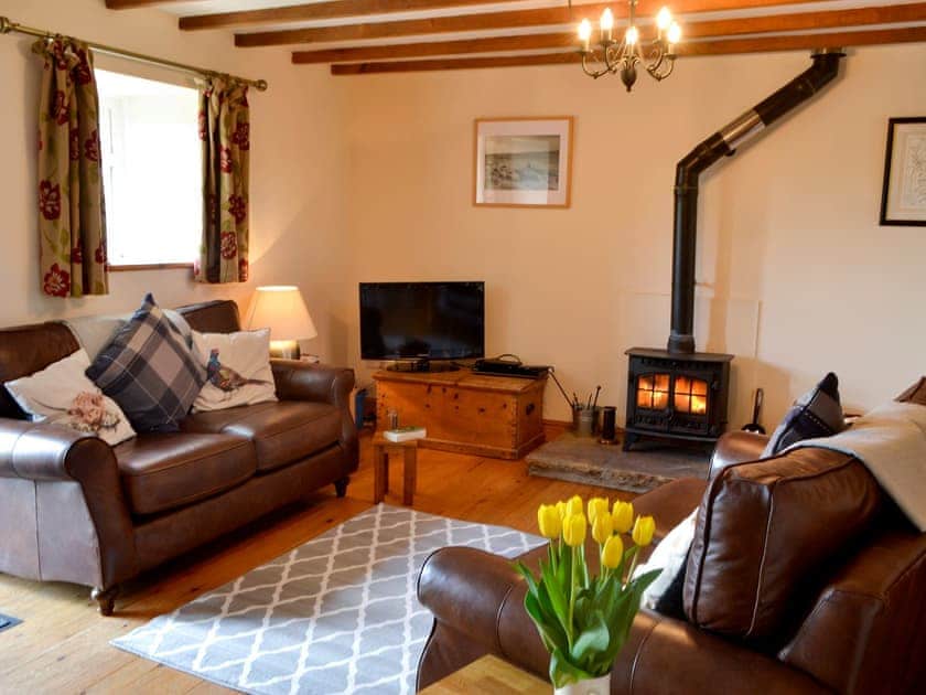 Cosy lounge Area with wood burning stove | The Stable - Knoppingsholme Cottages, Tarset, near Bellingham