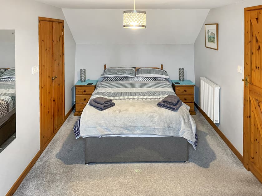 Tranquil double bedroom with sitting area | Cider Cottage - Well Farm Holiday Cottages, Holsworthy, near Launceston