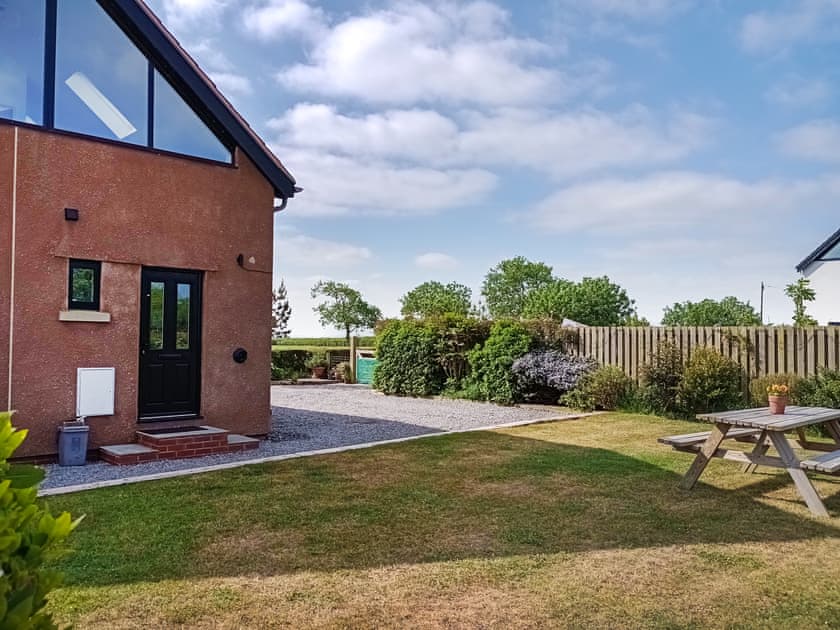 Side entrance, gravel parking area and garden area | The Sett, Stone Allerton, near Cheddar