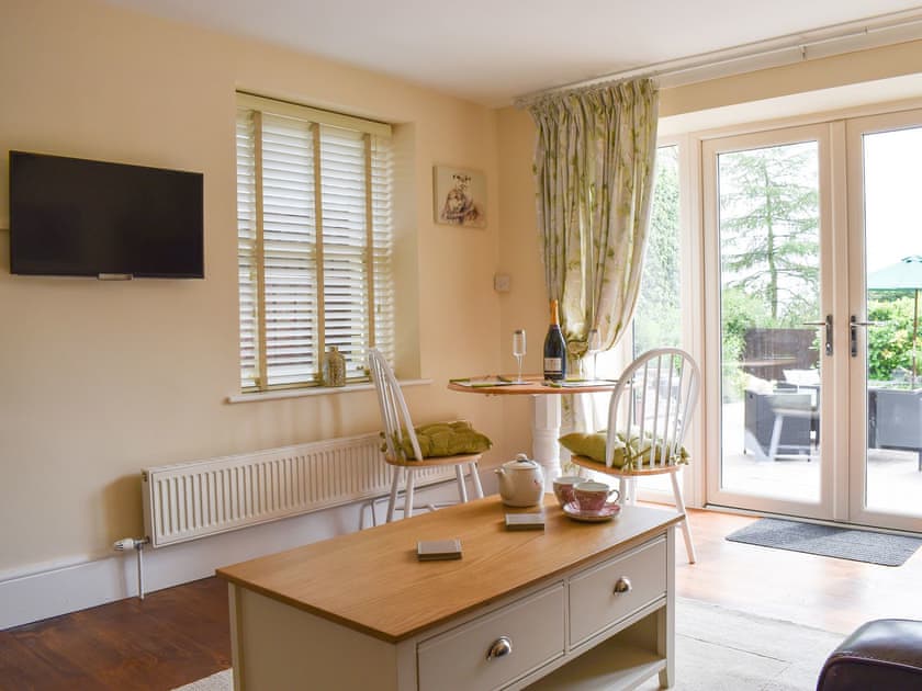 Living room/dining room with modest dining area | Woodside Cottage, Near Easington
