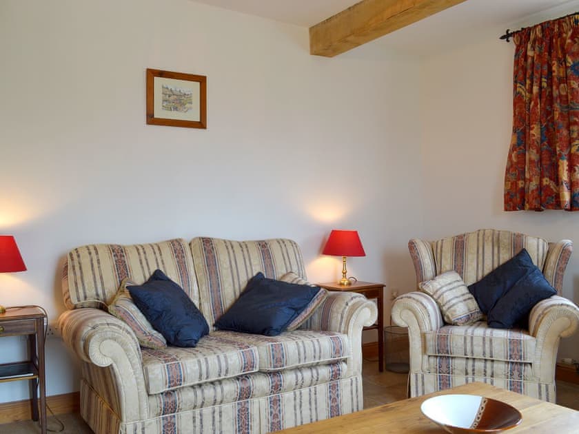 Comfy living room with patio doors  | Holly Cottage, Handley, near Matlock