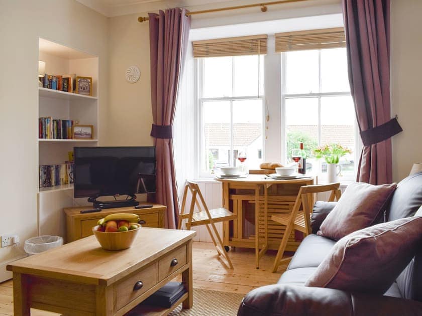 Welcoming living and dining area | Kirkview Cottage, Upper Largo, near Leven