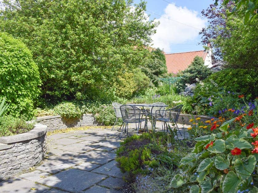 Well-maintained garden and patio area | Kirkview Cottage, Upper Largo, near Leven
