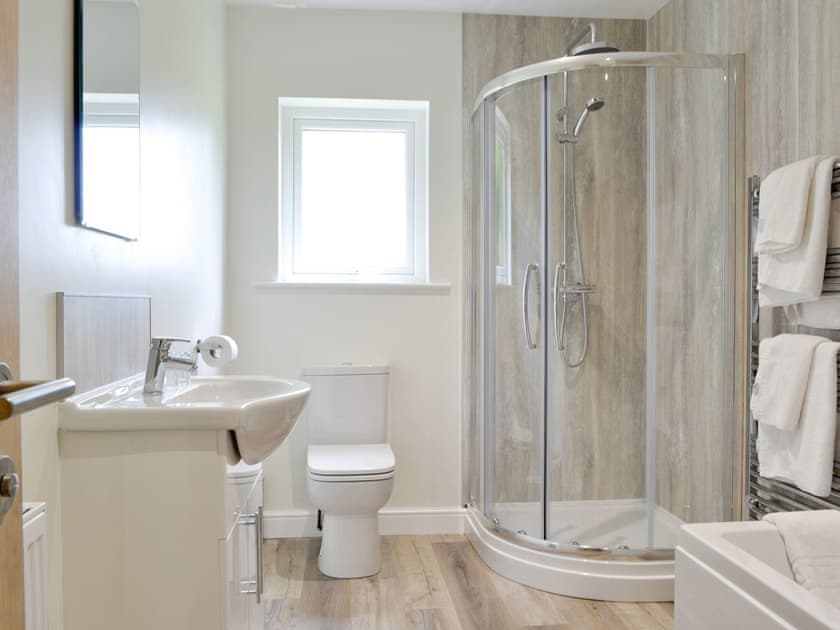 Family bathroom with bath and separate shower room | Lucy’s at the Grange - Grange Country House Holiday Cottages, Loweswater, near Cockermouth