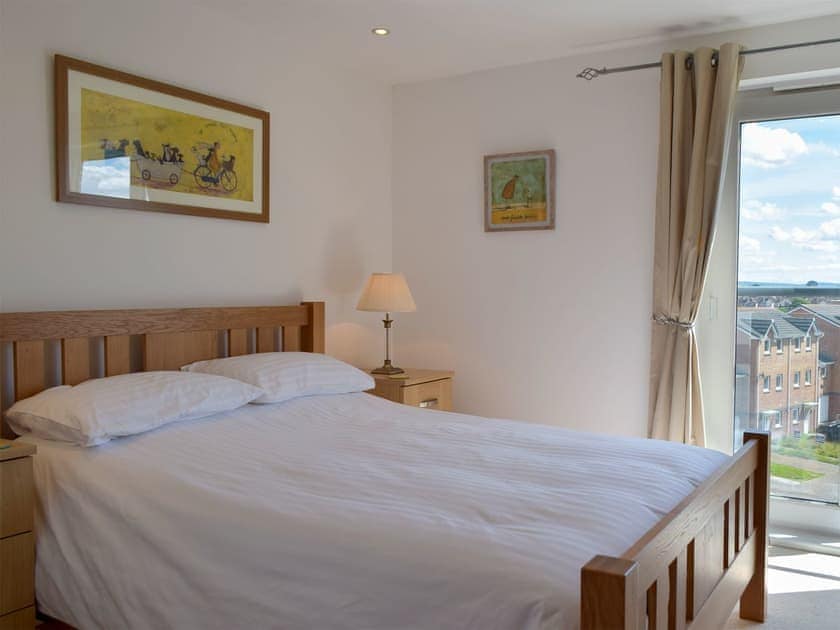 Calming bedroom with kingsize bed | Seaview, Llanelli