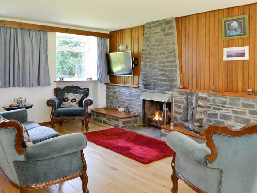 Spacious living area with open-fire | The Old School House, Portpatrick, near Stranraer