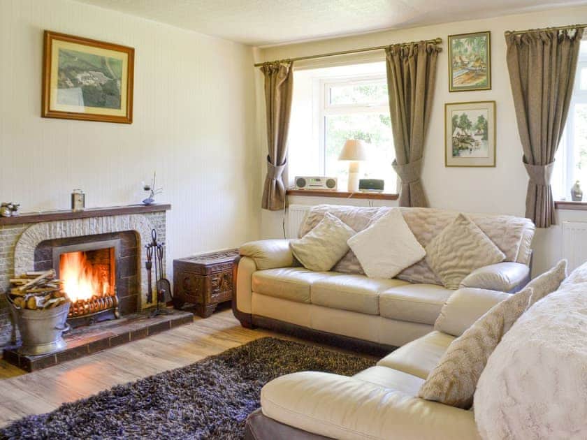 Comfy seating within the sitting room | The Old School House, Portpatrick, near Stranraer