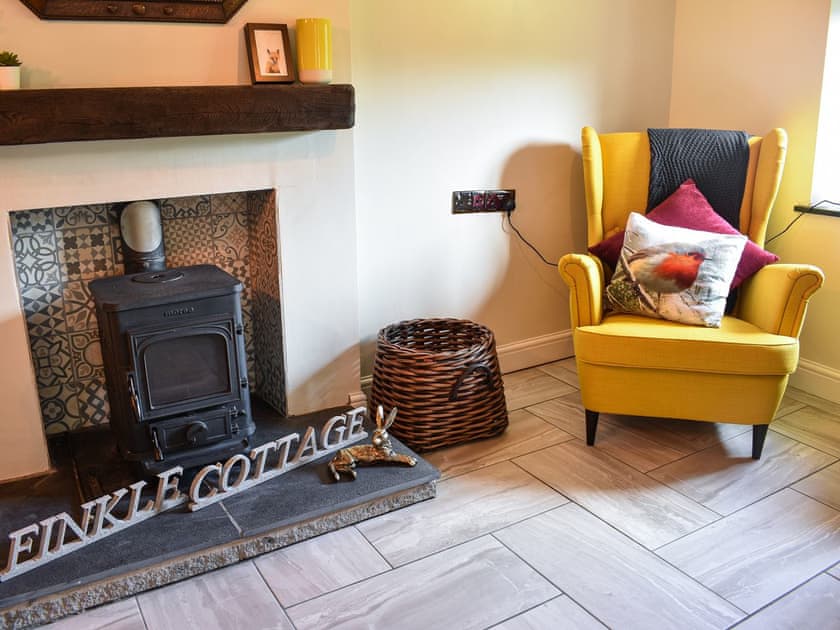 Sitting room with wood burner | Finkle Cottage, Pooley Bridge