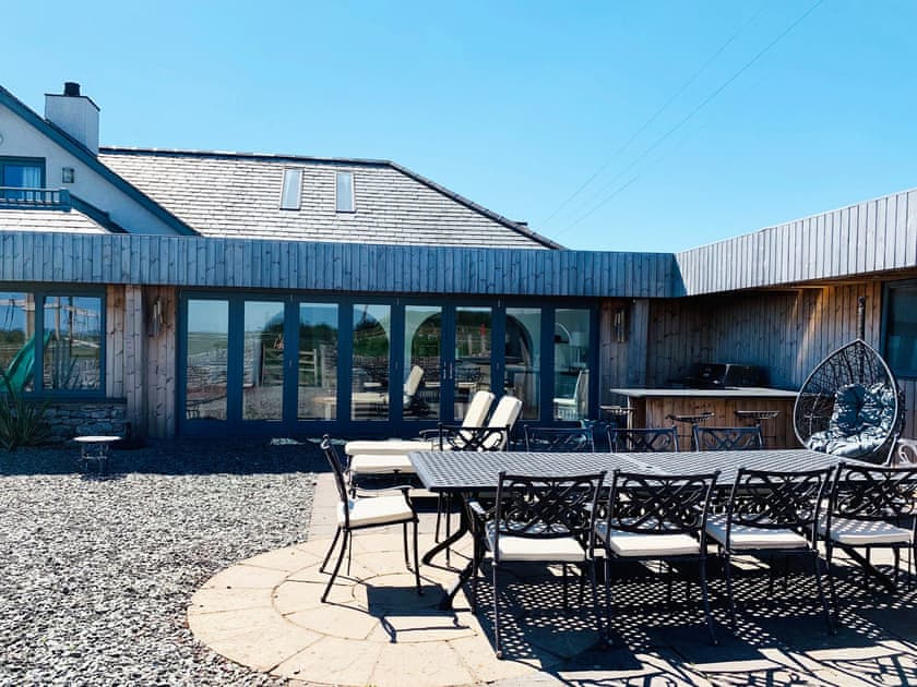 Enclosed courtyard with patio, garden furniture and gas BBQ | Meadow View, Stainton with Adgarley, near Dalton-in-Funess