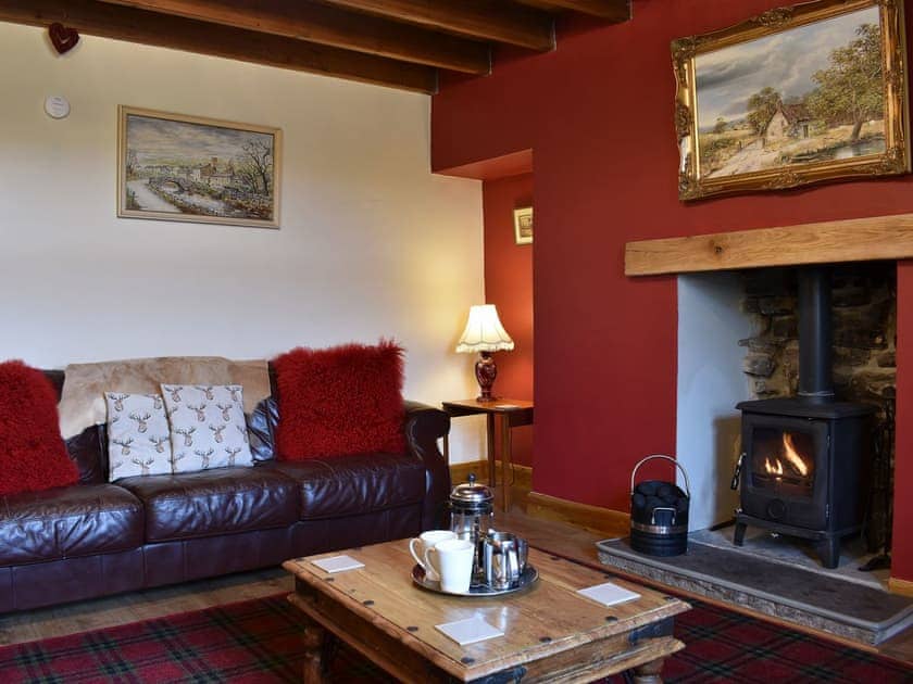 Cosy living room with wood burning stove | Ingleby Lodge, Askrigg, near Hawes