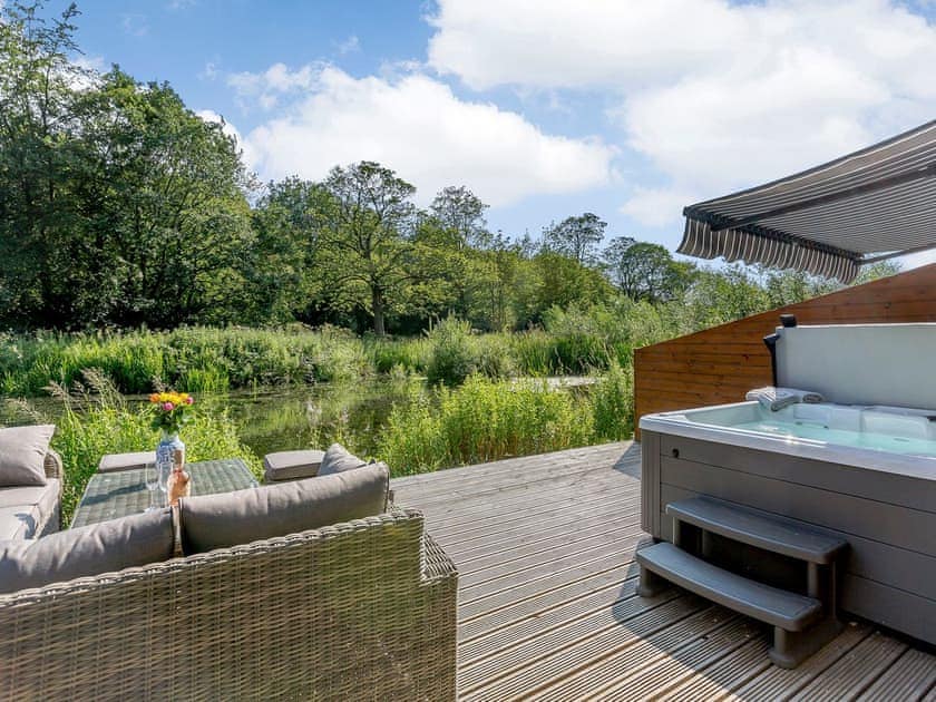 Impressive outdoor area with hot tub | Waterside Lodge Thirteen, Elland, near Brighouse 