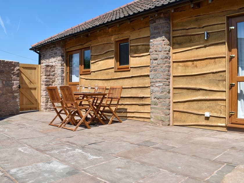 Spacious patio area | Cider Press Barn - Little Allaston Farm, Lydney