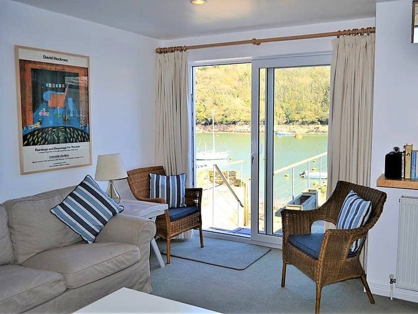 Living area with fantastic views of the river from the patio | Tarquins, Fowey