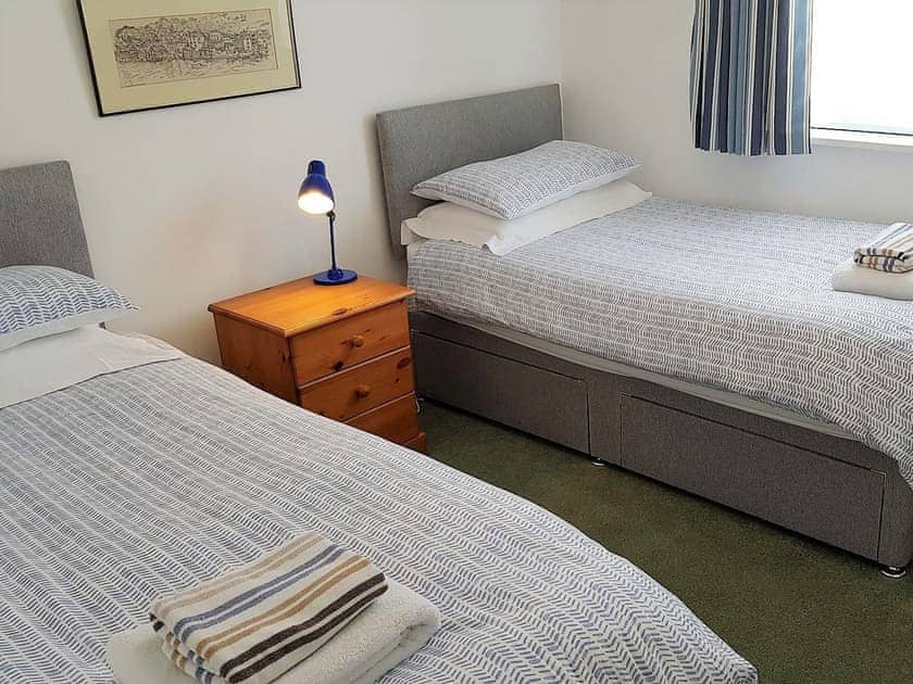The cosy twin bedroom also has views of the river | Tarquins, Fowey