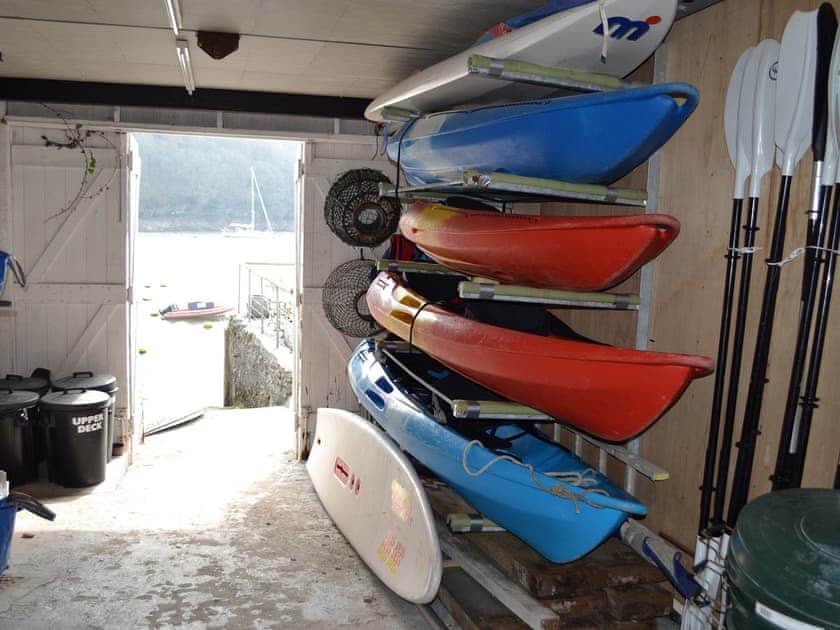 The boathouse for storage of wet gear, outboard motors and windsurfers | Tarquins, Fowey