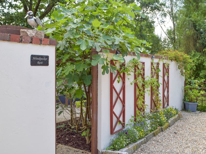 Attractive garden and grounds | Woodpecker Rest, Llechryd, near Cardigan