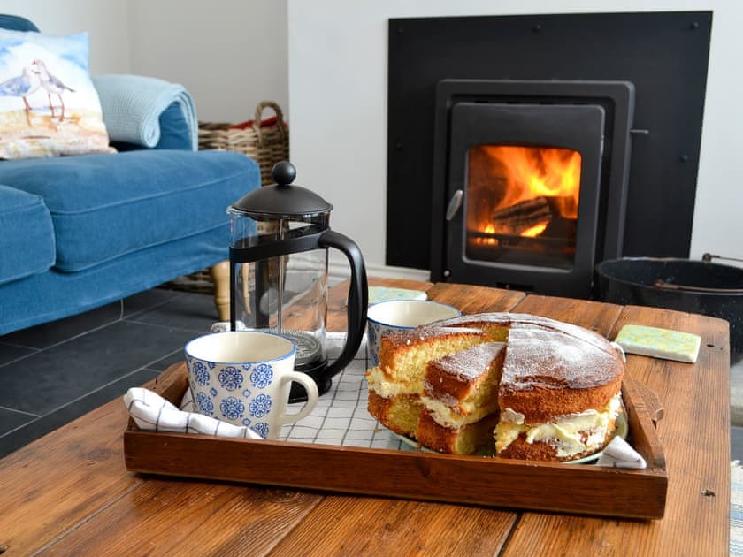 Cosy living room with wood burner | Morolwg, Borth, near Aberystwyth