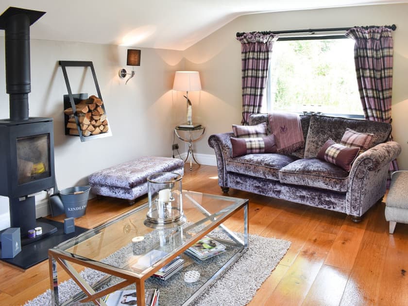 Living room with wood burner | Elleray Cottage, Windermere