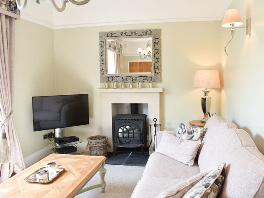 Living room with wood burner | Elleray Cottage, Windermere