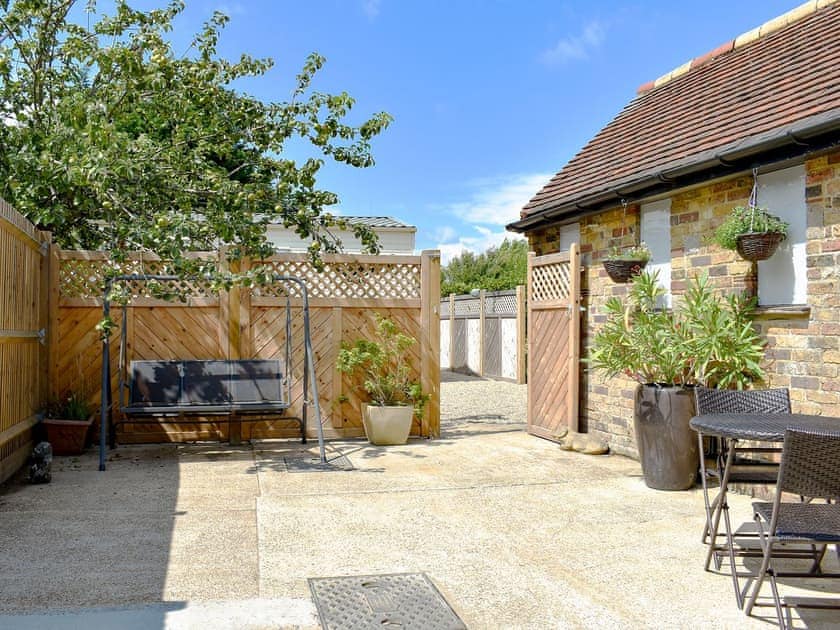 Spacious patio | Newhope, Winchelsea Beach, near Rye