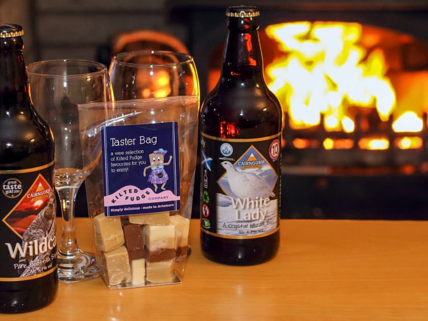 Roaring fire, local beer, local fudge.. Perfect!  | Holly Lodge, Aviemore