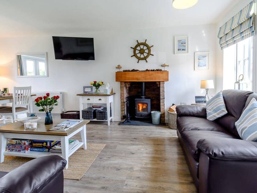 Welcoming living area with wood burner | The Bolthole - The Bay, Filey, near Scarborough