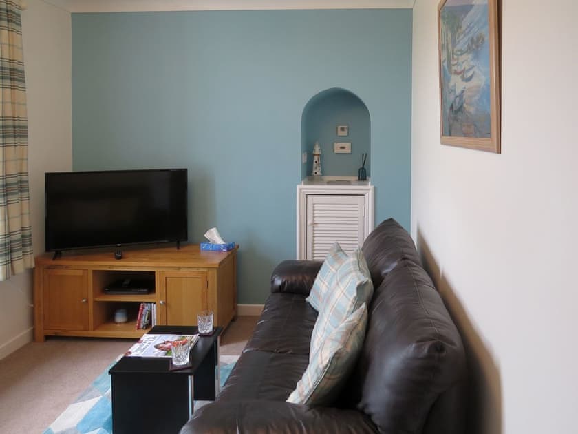 Cosy living room | Fisherman’s Cottage, Stairhaven by Glenluce