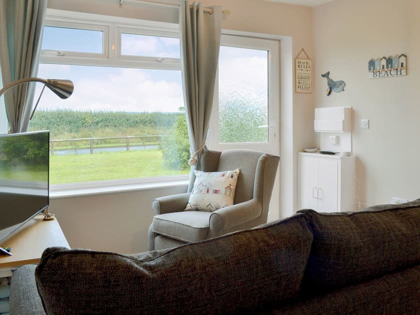 Light and airy living area | Beach House, Gristhorpe, near Filey