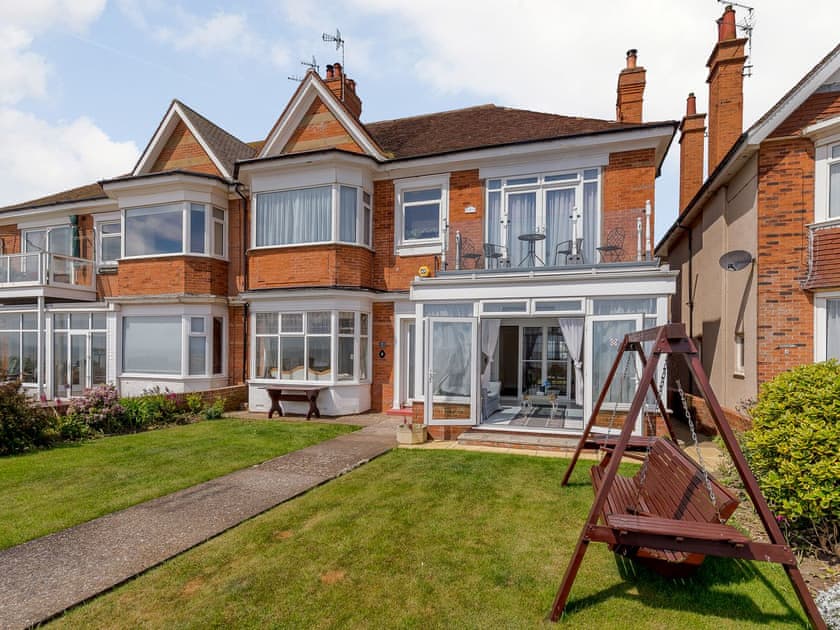 Front of property with garden and seating | Crystal Cove - South Cliff, Bridlington