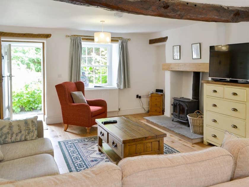 Beautiful living room with wood burner | Beech Cottage, Skelwith Bridge, near Ambleside