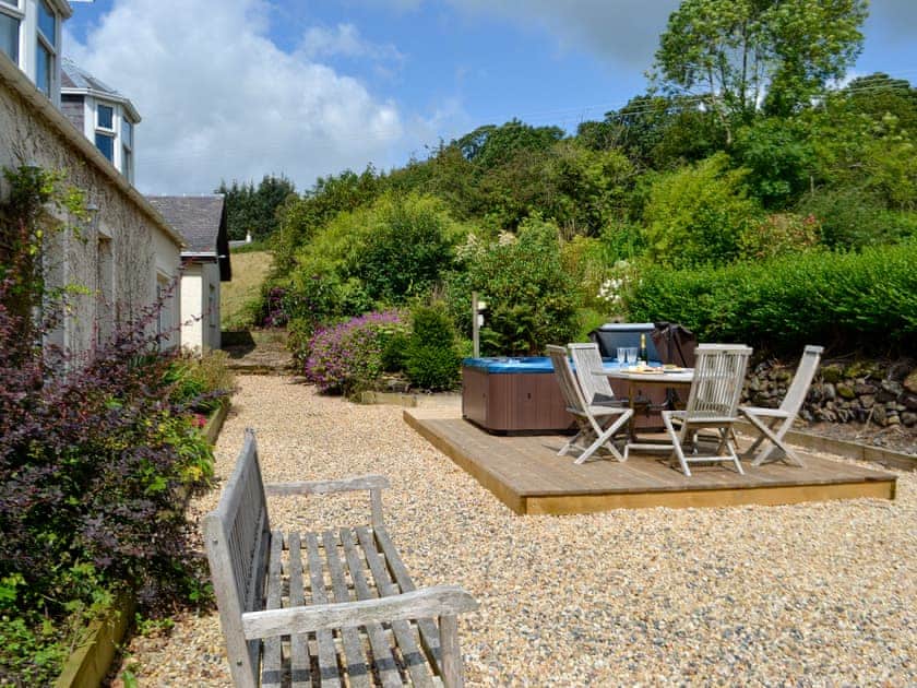 Outdoor area with hot tub | The Brewers Cottage - Roddenloft, Mauchline