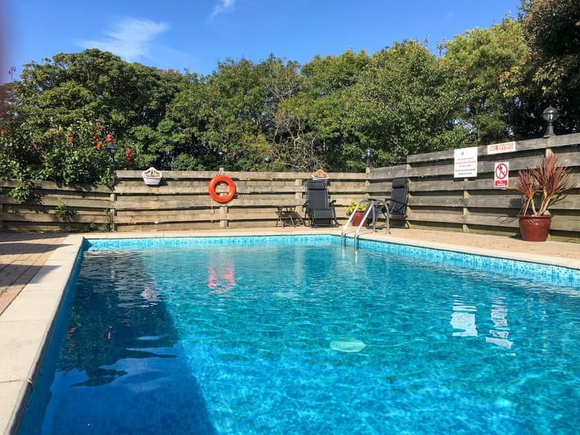 Shared, heated swimming pool | Crantock Cottage, Porth Cottage - Carnebo Farm, Goonhavern, near Newquay