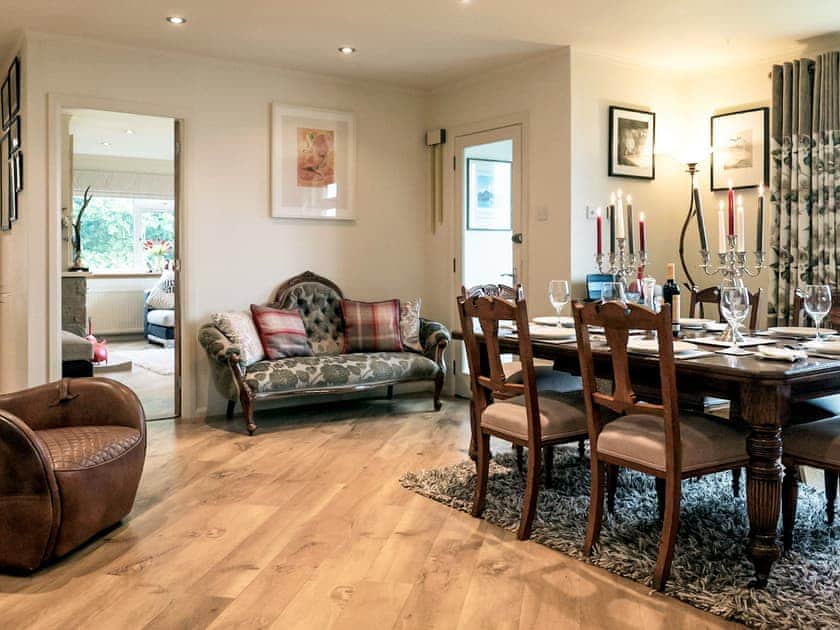 Well presented dining and communal space overlooking the sea | Tigh-na-Creige, Colintraive