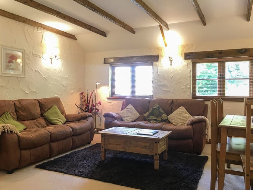 Living and dining room | Crantock Cottage - Carnebo Farm, Goonhavern, near Newquay