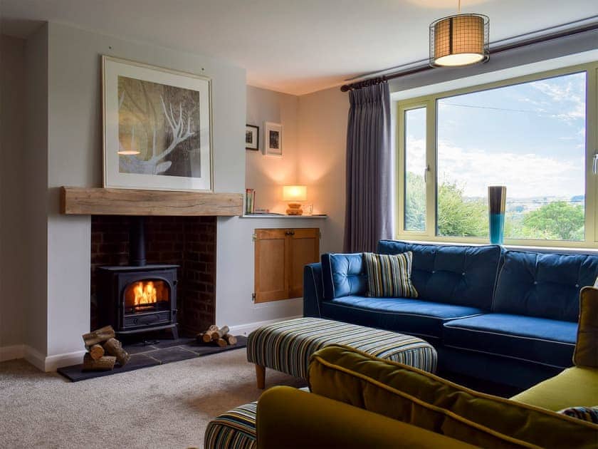 Comfortable living room with wood burner | Heather Lea, Summerbridge, near Harrogate
